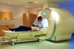 A radiographer and a patient with a similar MRI device. Image from University of Bristol Asset Bank.